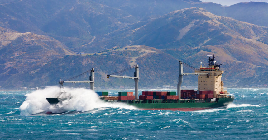 Loaded container freight ship in stormy sea AdobeStock_41847488-1-scaled.jpeg